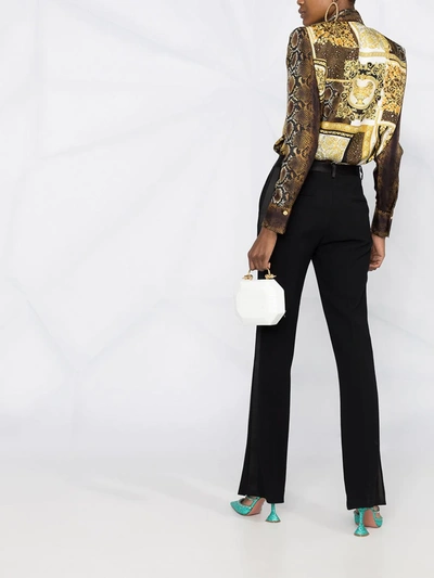 Shop Versace Printed Pussy-bow Blouse In Gold