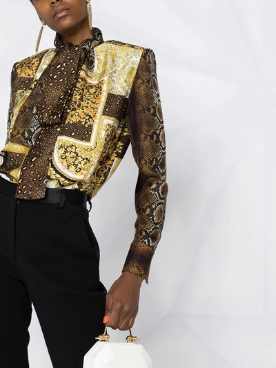 Shop Versace Printed Pussy-bow Blouse In Gold