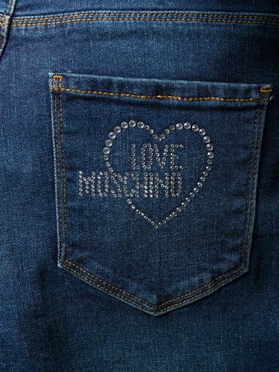 Shop Love Moschino Rhinestone-embellished Slim-fit Jeans In Blue