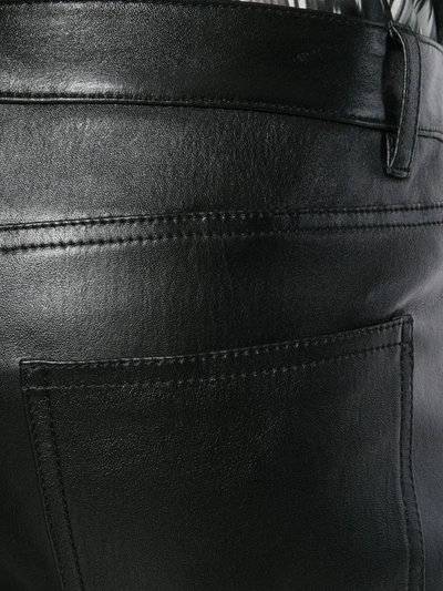 Shop Saint Laurent Skinny Leather Trousers In Black