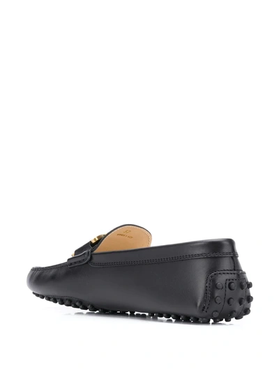 Shop Tod's Chain Buckle Leather Loafers In Black