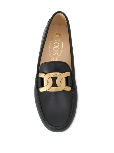 Shop Tod's Chain Buckle Leather Loafers In Black