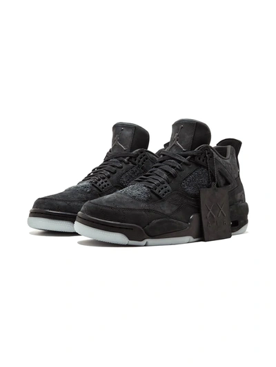 Shop Jordan X Kaws Air  4 Retro "black" Sneakers