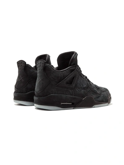 Shop Jordan X Kaws Air  4 Retro "black" Sneakers