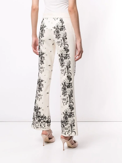 Shop Giambattista Valli Floral-embroidery Flared Trousers In Neutrals