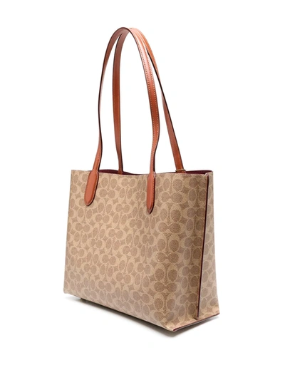 Shop Coach Printed Leather Tote Bag In Brown