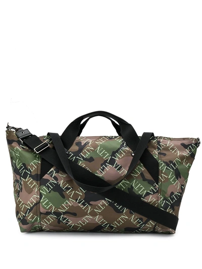 Shop Valentino Vltn Camouflage-print Holdall In Green