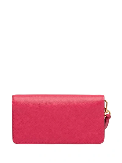 Shop Prada Saffiano Logo Plaque Mini Bag In Pink