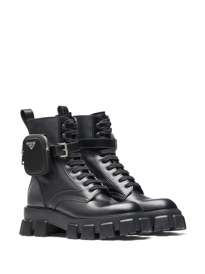 Shop Prada Ankle Pouch Combat Boots In Black