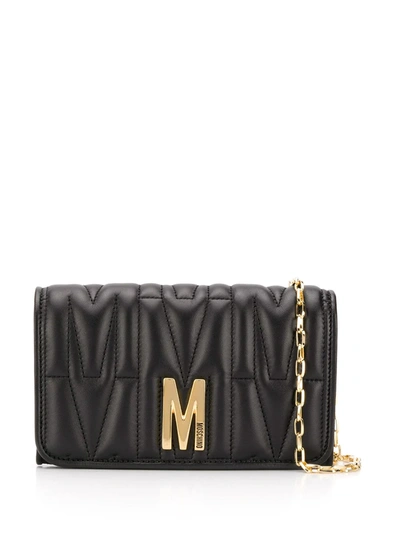 Shop Moschino Monogram-quilted Clutch Bag In Black