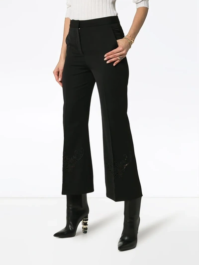 Shop Stella Mccartney Embroidered Kick Flare Wool Trousers In Black