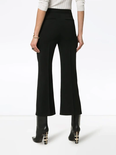 Shop Stella Mccartney Embroidered Kick Flare Wool Trousers In Black