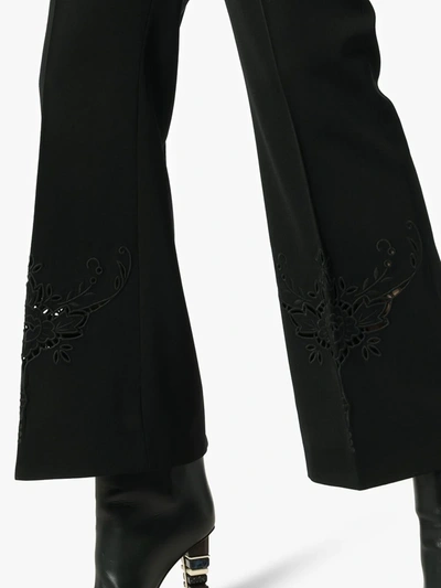 Shop Stella Mccartney Embroidered Kick Flare Wool Trousers In Black