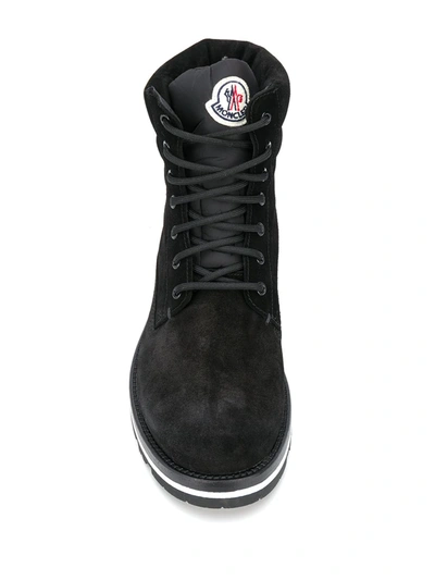 Shop Moncler Lace Up Boots In Black