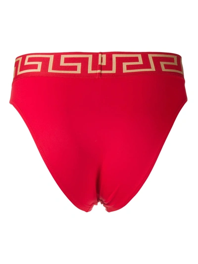 Shop Versace Greca Key Bikini Bottoms In Red