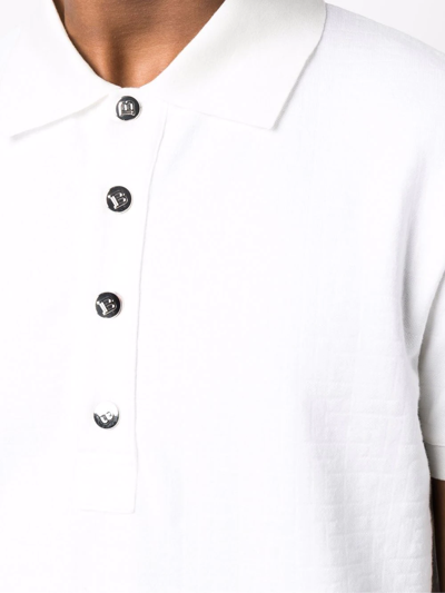 Shop Balmain Embossed Pb-monogram Polo Shirt In Weiss
