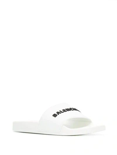 Shop Balenciaga Logo-embossed Pool Slides In White