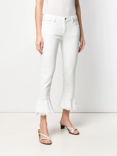 Shop Michael Michael Kors Izzy Flounce Jeans In White