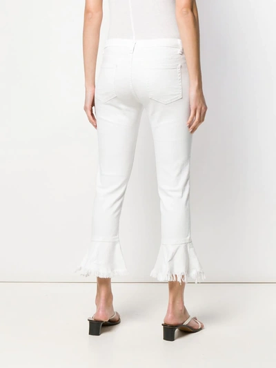 Shop Michael Michael Kors Izzy Flounce Jeans In White