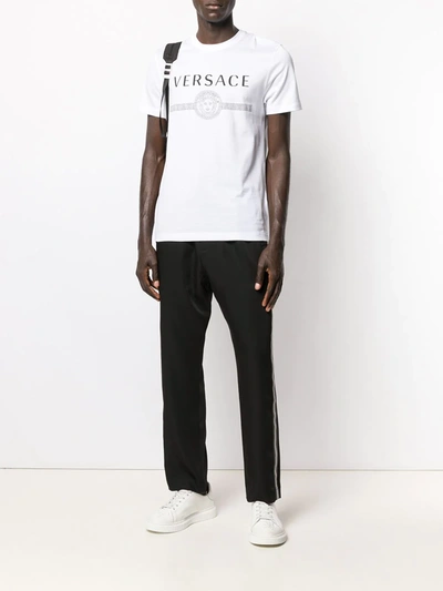 Shop Versace Printed Logo T-shirt In White