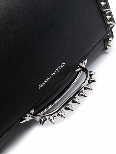 Shop Alexander Mcqueen Studded Leather Clutch Bag In Schwarz