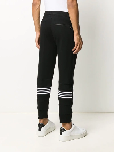 Shop Neil Barrett Stripe Print Detail Track Trousers In Black