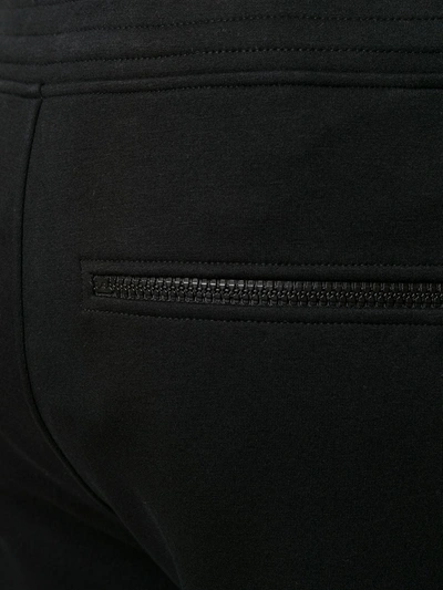 Shop Neil Barrett Stripe Print Detail Track Trousers In Black