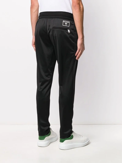 Shop Dolce & Gabbana Patch Logo Track Pants In Black
