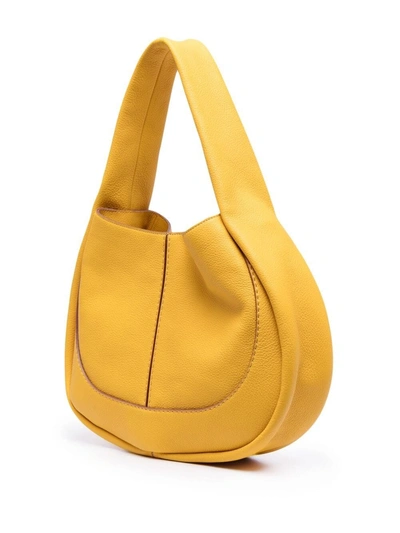 Shop Tod's Debossed-logo Shoulder Bag In Yellow
