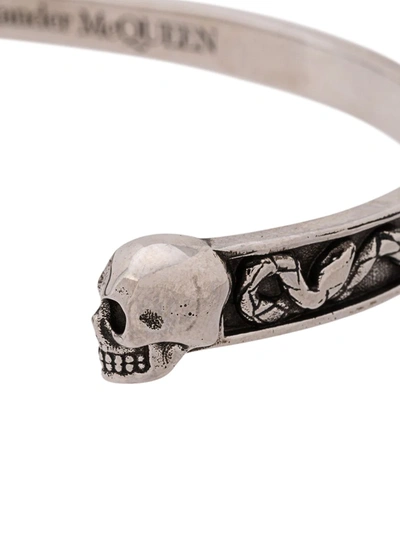 Shop Alexander Mcqueen Twin Skull Bracelet In Silver