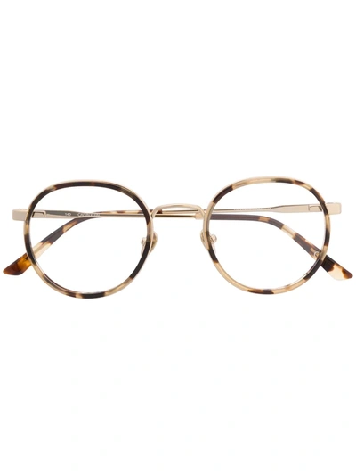 Shop Calvin Klein Tortoiseshell Round-frame Glasses In Neutrals