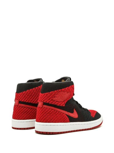 Shop Jordan Air  1 Retro Hi Flyknit "bred" Sneakers In Black