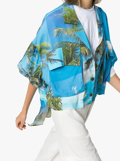 Shop Natasha Zinko Tropical-print Dip Hem Shirt In Blue