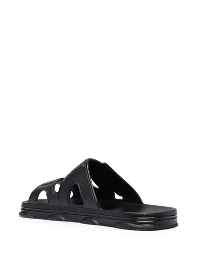 Shop Gcds Logo-lettering Flat Sandals In 黑色