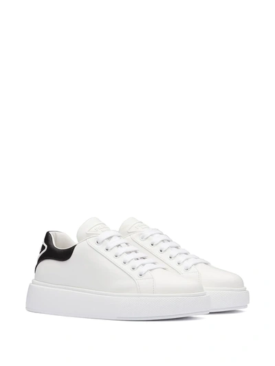 Shop Prada Contrast-heel Low-top Sneakers In White