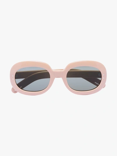 Shop Gucci Oval Frame Tinted Sunglasses In Neutrals