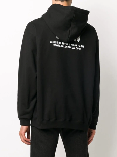 Shop Balenciaga Logo-print Hoodie In Black