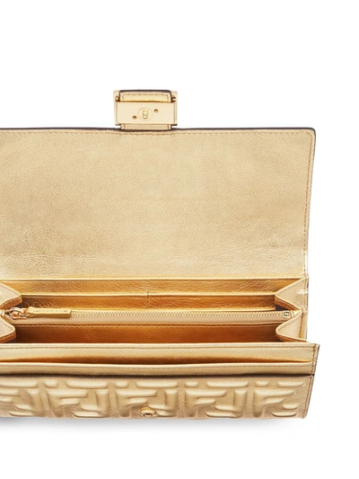 Shop Fendi Baguette Continental Wallet In Gold
