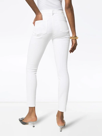 Shop Paige Hoxton Skinny Jeans In White