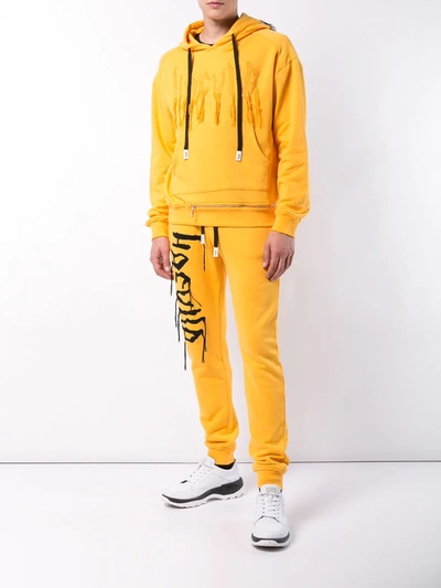 Shop Haculla Logo Embroidered Track Trousers In Yellow