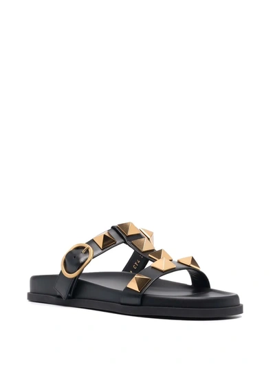 Shop Valentino Roman Stud Slide Sandals In Black