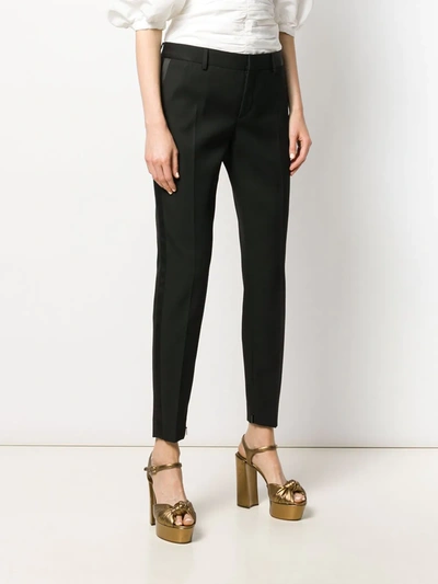 Shop Saint Laurent Satin Stripe Tailored Trousers In Black