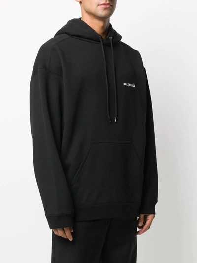 Shop Balenciaga Logo-print Hoodie In Black