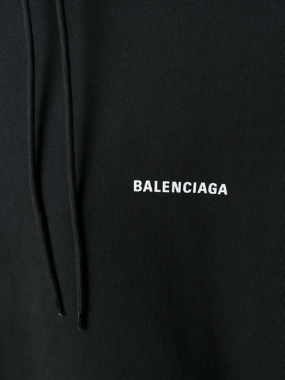 Shop Balenciaga Logo-print Hoodie In Black