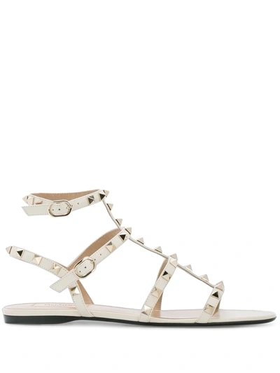Shop Valentino Rockstud Caged Flat Sandals In White