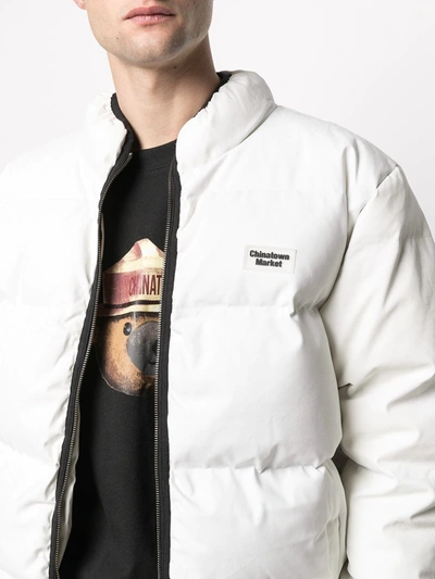 Shop Chinatown Market Chest Patch Padded Jacket In White