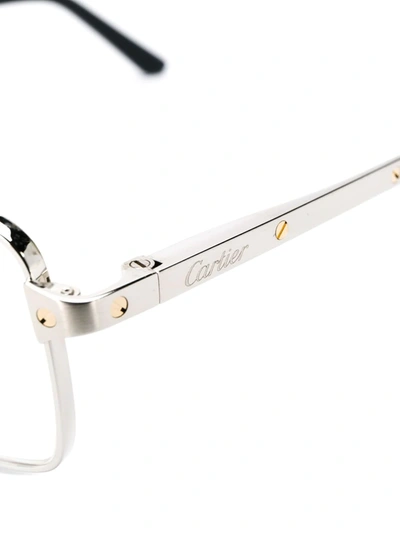 Shop Cartier Rectangular Frame Glasses In Silver