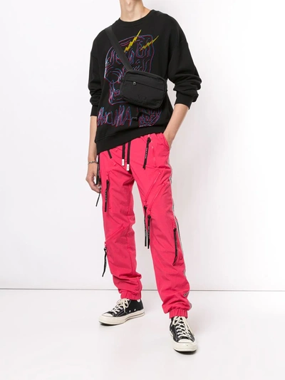 Shop Haculla Multi-zip Track Trousers In Pink