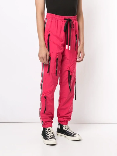 Shop Haculla Multi-zip Track Trousers In Pink