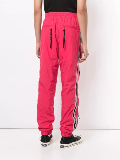 Shop Haculla Multi-zip Track Trousers In Pink